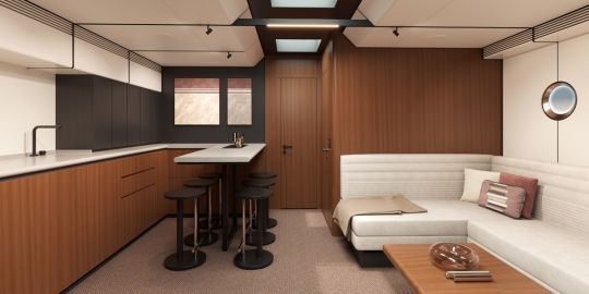 L'espace cuisine a bâbord et le salon intérieur en vis-à -vis