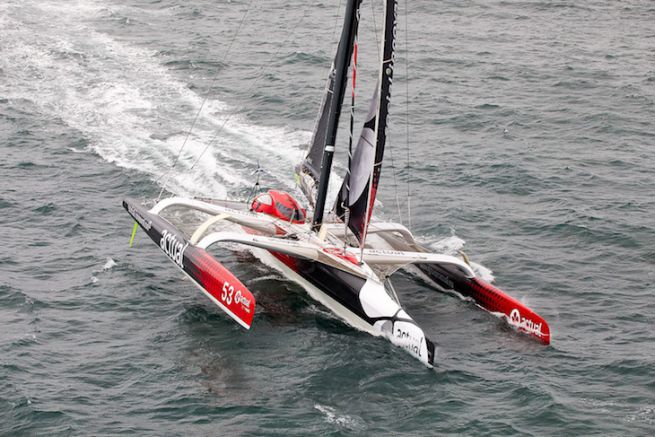 The trimaran Actual, on the attack of the Round the World Record upside down