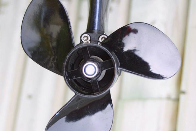 What is the risk of a boat engine propeller in the water?