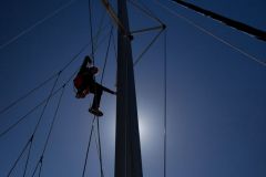 Going up to the mast of the sailboats, why?