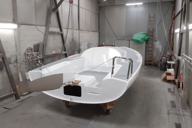 Hull of the Mini 6.50 in transformation for the future kite wing towed boat of Gildas Mah