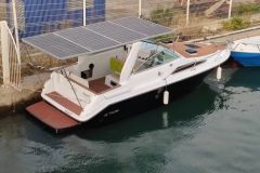 Surprising, this Searay covered with solar panels