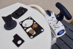 How do I replace the marine toilet gasket kit?