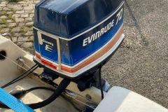 A cable steering system on an outboard motor