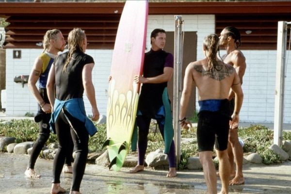 Keanu Reeves grapples with locals in the cult classic Point Break